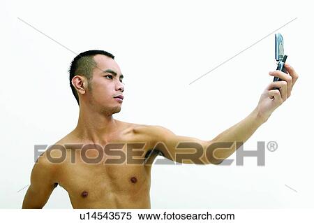 Mobile Phone, Young Adult, Lifestyles, White Background, Holding View Large Photo Image Stock Photography - Mobile Phone, Young Adult, Lifestyles, White Background, Holding. Fotosearch