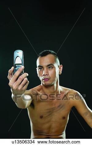 Show Tech, Indoor, Bare Chest, Self Portrait Photography View Large Photo Image Picture - Show Tech, Indoor, Bare Chest, Self Portrait Photography. Fotosearch