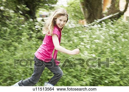 Young girl running View Large Photo Image Picture - Young girl running. Fotosearch
