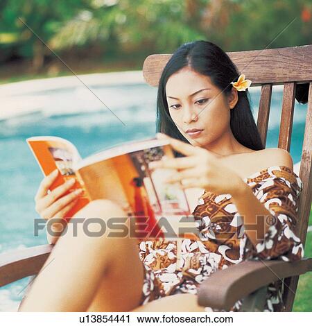 Black Hair, Chair, Book, Asian Ethnicity View Large Photo Image Stock Image - Black Hair, Chair, Book, Asian Ethnicity. Fotosearch