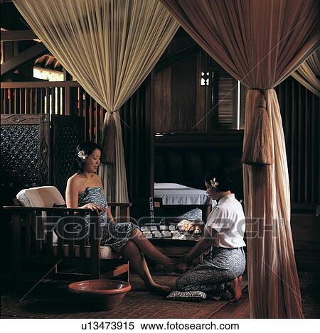 Hardwood Floor, Beauty Treatment, Legs Crossed At Knee, Home Interior, Sitting View Large Photo Image Stock Photography - Hardwood Floor, Beauty Treatment, Legs Crossed At Knee, Home Interior, Sitting. Fotosearch