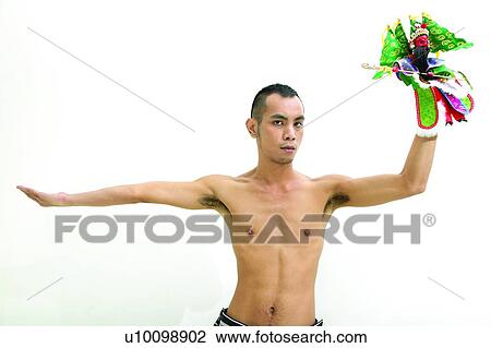 Stock Image - Asian Ethnicity, Close-Up, Black Hair, Bare Chest, Arm Outstretched. Fotosearch