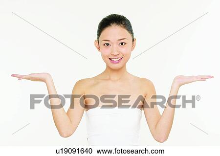Asian Ethnicity, Close-Up, Casual Clothing, Black Hair, Arms Raised View Large Photo Image Stock Image - Asian Ethnicity, Close-Up, Casual Clothing, Black Hair, Arms Raised. Fotosearch