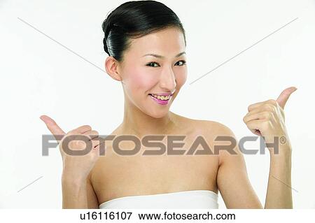 Asian Ethnicity, Close-Up, Casual Clothing, Black Hair, Agreement View Large Photo Image Stock Photo - Asian Ethnicity, Close-Up, Casual Clothing, Black Hair, Agreement. Fotosearch