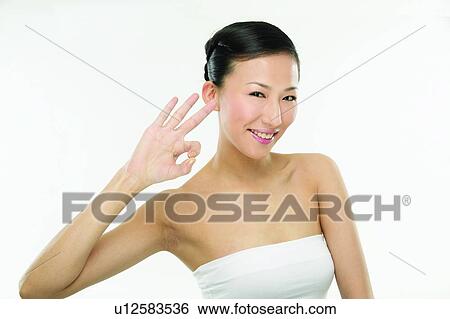 Asian Ethnicity, Close-Up, Casual Clothing, Black Hair, Agreement View Large Photo Image Stock Photograph - Asian Ethnicity, Close-Up, Casual Clothing, Black Hair, Agreement. Fotosearch