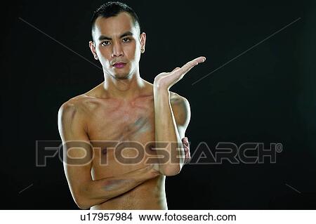Bare Chest, Close-Up, Black Hair, Black Background, Asian Ethnicity View Large Photo Image Picture - Bare Chest, Close-Up, Black Hair, Black Background, Asian Ethnicity. Fotosearch
