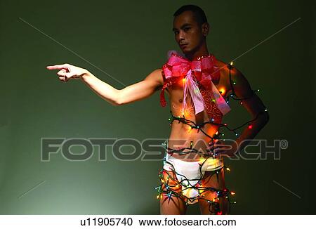 Bizarre Fashion, Young Adult, Posing, Hand On Hip, One Young Man Only, Asian Ethnicity View Large Photo Image Stock Image - Bizarre Fashion, Young Adult, Posing, Hand On Hip, One Young Man Only, Asian Ethnicity. Fotosearch
