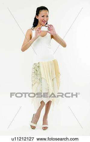 Stock Photo - Black Hair, Casual Clothing, Asian Ethnicity. Fotosearch