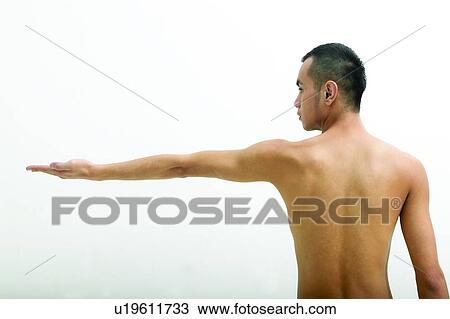 Stock Image - Black Hair, Concentration, Close-Up, Asian Ethnicity. Fotosearch