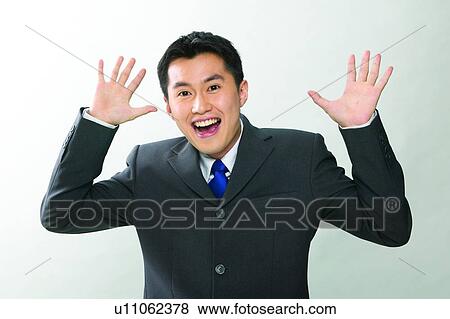 Stock Photo - Business Suit, Mouth Open, Waist-Up, Spirit, Communication, Black Hair. Fotosearch