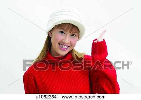 Casual Clothing, One Young Woman Only, Gesturing, Brown Hair, Asian Ethnicity, Posing View Large Photo Image Stock Image - Casual Clothing, One Young Woman Only, Gesturing, Brown Hair, Asian Ethnicity, Posing. Fotosearch