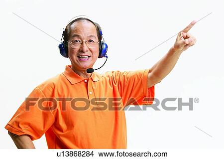 Picture - Communication, One Mature Man Only, Real People, One Person, Eyeglasses, Gesturing. Fotosearch