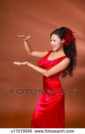Stock Photography - East, Evening Gown, Standing, Indoor, Three-Quarter Length, Spirit Signals, Formal Clothing. Fotosearch