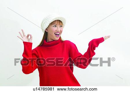 Stock Image - Gesturing, Happiness, One Young Woman Only, Perfection, Ok Sign. Fotosearch