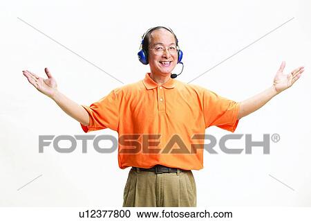 Stock Image - Indoor, Looking Away, Eyeglasses, Standing. Fotosearch