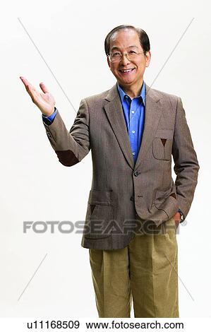 Stock Photo - Mature Adult, Eyeglasses, Confidence, Full Suit. Fotosearch