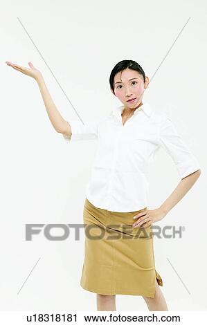 Stock Image - One Person, Spirit, Standing, Black Hair, Indoor, Signals. Fotosearch