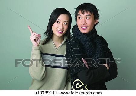 Pointing, Spirit, Young Men, Young Adult, Close-Up, Happiness, Spirit Signals View Large Photo Image Stock Image - Pointing, Spirit, Young Men, Young Adult, Close-Up, Happiness, Spirit Signals. Fotosearch