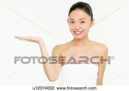 Stock Image - Spirit, Portrait, Tube Top, Looking At Camera, One Young Woman Only, Waist-Up. Fotosearch