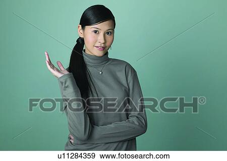 Young Adult, Asian Ethnicity, Casual Clothing, One Young Woman Only, Long Hair, Turtleneck View Large Photo Image Stock Photo - Young Adult, Asian Ethnicity, Casual Clothing, One Young Woman Only, Long Hair, Turtleneck. Fotosearch