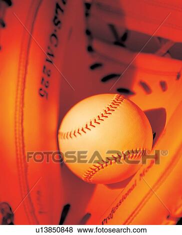 Stock Photo - ball, baseball, catchers mitt. Fotosearch