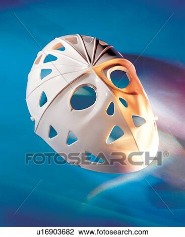 Stock Image - goalie, covering, sports, face, hockey, recreation. Fotosearch