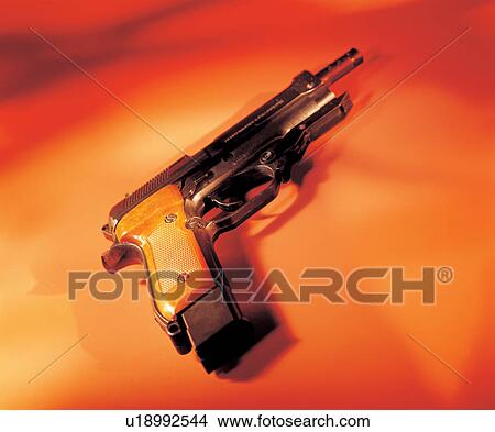 Picture - starters pistol, weapon, relay, starting, event, athletics, gun. Fotosearch