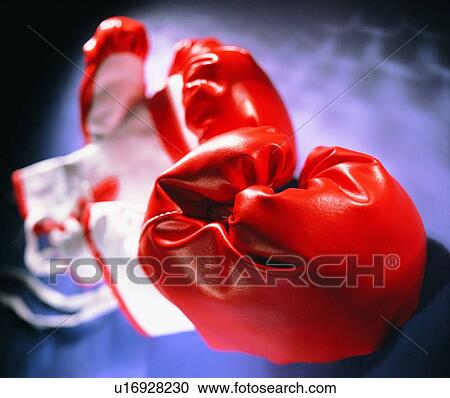 Stock Image - close up, boxing gloves, sporting good. Fotosearch