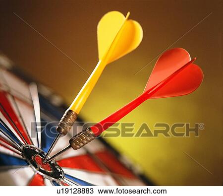 Stock Image - darts, close up, dartboard, sporting good, target. Fotosearch