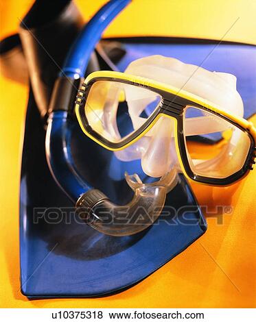Stock Photo - sporting good, close up, diving mask, fins. Fotosearch