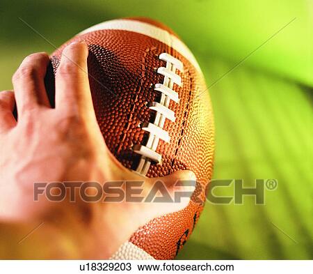 sporting good, close up, football, hand View Large Photo Image Stock Image - sporting good, close up, football, hand. Fotosearch