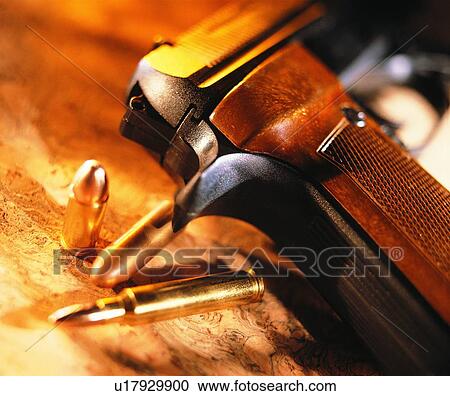 sporting good, close up, pistol, bullets View Large Photo Image Stock Image - sporting good, close up, pistol, bullets. Fotosearch