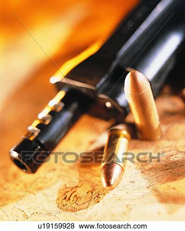 sporting good, close up, pistol, bullets View Large Photo Image Stock Photo - sporting good, close up, pistol, bullets. Fotosearch