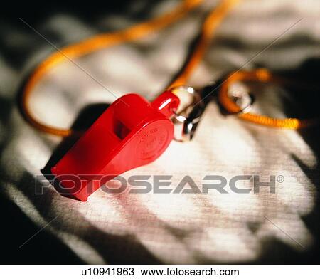 Stock Image - sporting good, close up, whistle, light, shadow. Fotosearch