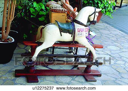 Stock Photo - food, pony, herbivorous animal, bread, animal, scenery, warning. Fotosearch