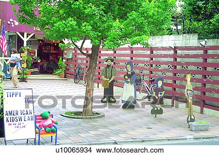 Picture - foreign, toy, tree, scenery, bear, flag, street. Fotosearch