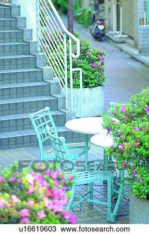 Stock Image - path, leaf, handrail, chair, table, outdoor, plant. Fotosearch