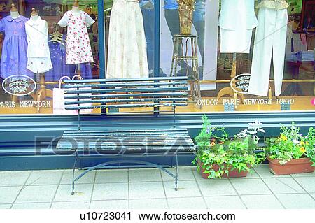 Stock Image - scenery, foreign, sidewalk, store, clothing store, clothes. Fotosearch