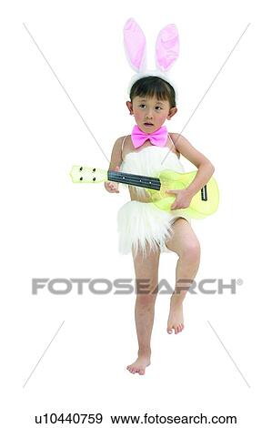 Stock Photo - Black Hair, Asian Ethnicity, Barefoot, Bangs, Baby Rabbit, Child, 4-5 Years. Fotosearch