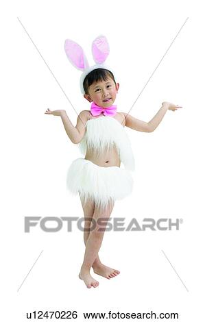 Stock Photograph - Black Hair, Asian Ethnicity, Barefoot, Bangs, Baby Rabbit, Child, 4-5 Years. Fotosearch