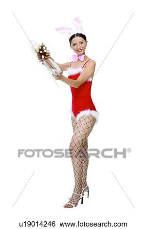 Stock Photograph - Champagne, Asian Ethnicity, Bow, Black Hair, Beverage, Alcohol. Fotosearch