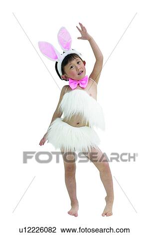 Stock Image - Fun, Asian Ethnicity, Innocence, Child, Carefree, White Background, Indoor. Fotosearch