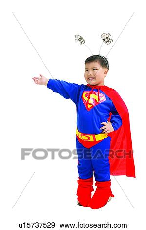 Stock Photo - Gesturing, Indoor, Standing, Childhood, Asian Ethnicity, White Background. Fotosearch