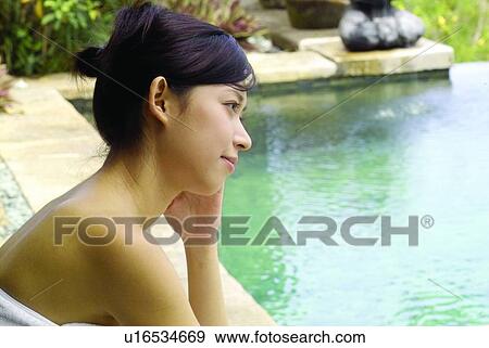 Stock Photo - Beautiful, Eastern, Close-Up, Brown Hair, Asian Ethnicity. Fotosearch