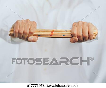 Breaking, Team Work, Stick, Integrity, One Person, Close-Up View Large Photo Image Stock Photo - Breaking, Team Work, Stick, Integrity, One Person, Close-Up. Fotosearch