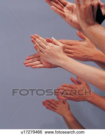 Clapping, Group Of People, Colored Background, Close-Up, Applauding View Large Photo Image Stock Photograph - Clapping, Group Of People, Colored Background, Close-Up, Applauding. Fotosearch
