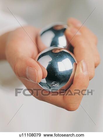 Stock Photo - Close-Up, Holding, Human Hand, Hand, Indoor. Fotosearch