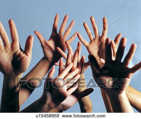 Stock Photo - Colored Background, Hand, Alertness, Part Of, Team Work, Indoor. Fotosearch