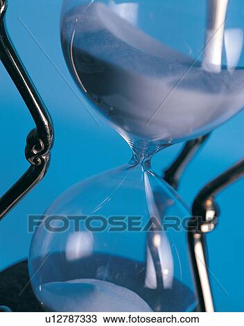 Colored Background, Indoor, Hour Glass, Tilt View Large Photo Image Stock Image - Colored Background, Indoor, Hour Glass, Tilt. Fotosearch