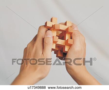Stock Photo - Puzzle, Human Hand, Indoor, Part Of, Challenge, Hand. Fotosearch